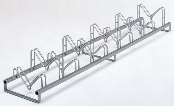 Multiple bicycle stand Kiel, free-standing, Material: raw steel, Surface: hot-dip galvanised passivated, frame with drilled holes for screwing on, Length: 3000 mm, Distance centre - centre of bracket: 300 mm, Frame thickness: 40 x 40 mm, Clip Ø: 16 mm, No. of parking spaces: 10, No. of holes: 3, Hole: Ø11 mm